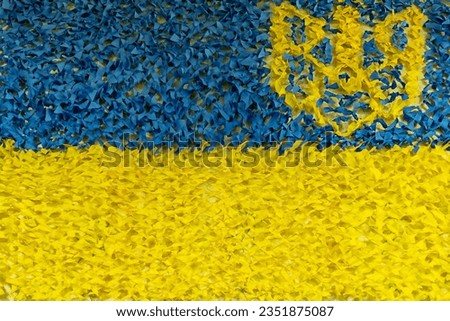 Ukrainian flag as a camouflage net. Unusual Ukrainian flag.
