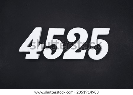 Black for the background. The number 4525 is made of white painted wood.