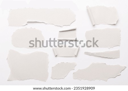 Art collage of pieces of ripped paper with torn edges. Sticky notes collection white colors, shreds of notebook pages. Abstract background Royalty-Free Stock Photo #2351928909