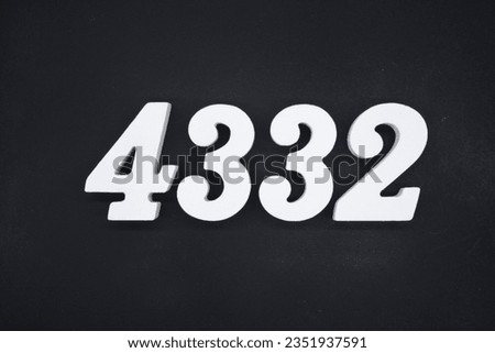 Black for the background. The number 4332 is made of white painted wood.
