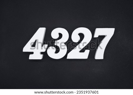 Black for the background. The number 4327 is made of white painted wood.