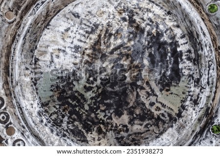 A large metal plate for catering. Grunge metal photo texture.