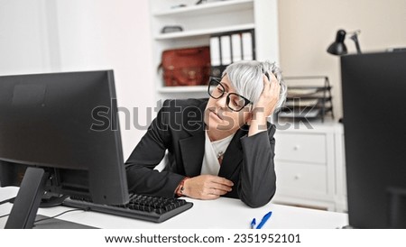 Young woman business worker tired working at office