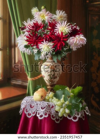 Still life with bouquet of dahlia flowers and fruits