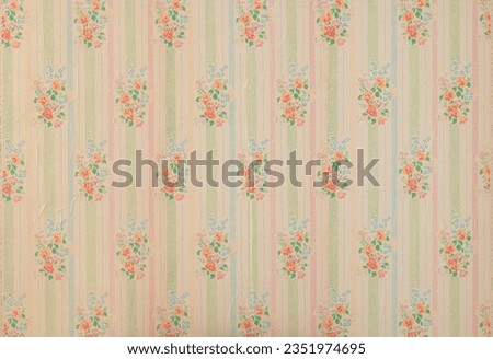 Old wallpaper on the wall. Old wallpaper for texture or background. Royalty-Free Stock Photo #2351974695