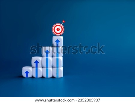 3d Goal target icon and arrows on white blocks as business chart steps on blue background with copy space. The business growth graph process, goal, success, economic improvement and analysis concepts.