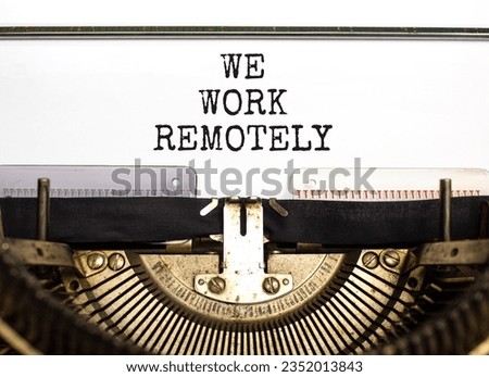We work remotely symbol. Concept words We work remotely typed on beautiful retro old typewriter. Beautiful white background. Business we work remotely concept. Copy space.