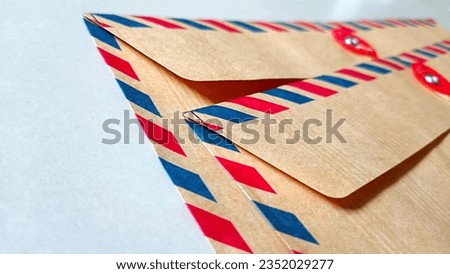 Close up mail envelope with red and blue stripes