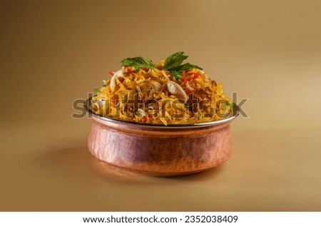 indian chicken biryani, Spicy chicken biryani food photography Royalty-Free Stock Photo #2352038409