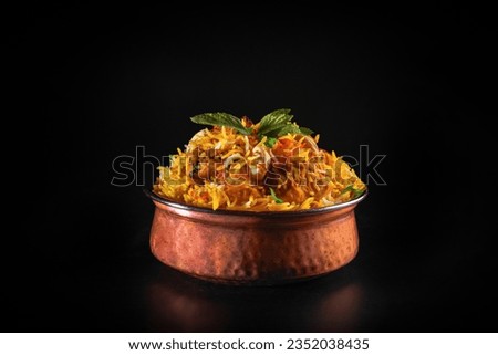 indian chicken biryani, Spicy chicken biryani food photography Royalty-Free Stock Photo #2352038435