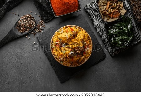 indian chicken biryani, Spicy chicken biryani food photography Royalty-Free Stock Photo #2352038445