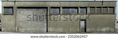 Industrial building facade wallpaper front entrance Royalty-Free Stock Photo #2352062457