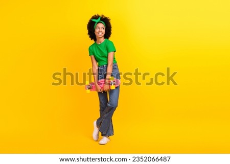Full length photo of minded creative cute girl look empty space brainstorming isolated on yellow color background