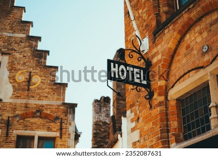 Hotel sign in historical centre of Bruges, Belgium.