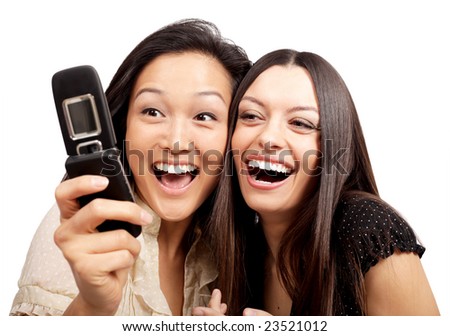 Two friends having a blast with a phone