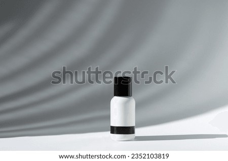 Facial skin care, moisturizer concept. Fashionable and Elegant cosmetic product on white background with creative long shadow. Skin care product ad. Minimal beauty product styling and photography. 