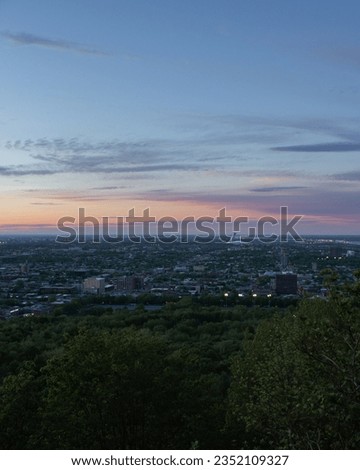 Sunset in a city from a hill