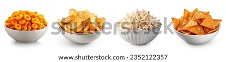Snack and crisps set. Ring cheese puffs, potato chips, popcorn, nachos, collection set. Chips and snacks in bowl, closeup set. Royalty-Free Stock Photo #2352122357