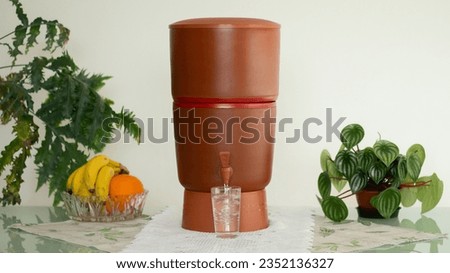 Clay water filter (filtro de água de barro) common in Brazilian households.	 Royalty-Free Stock Photo #2352136327