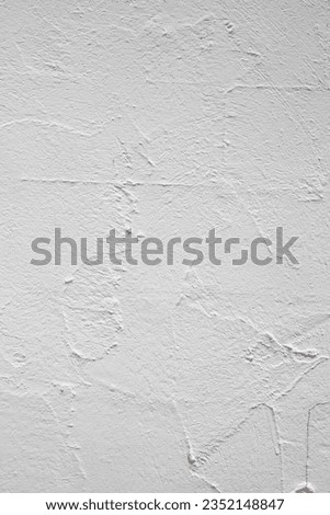 Textured Tranquility: Close-Up of White Plaster Wall for Backgrounds