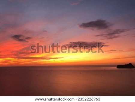 Beautiful Sea in sunset or sunrise light sky over sea in summer season,Image from drone camera,Amazing sea waves ocean sunset sky background 