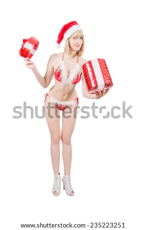 Snow Maiden in a bikini with a gift in a box. Isolated on white