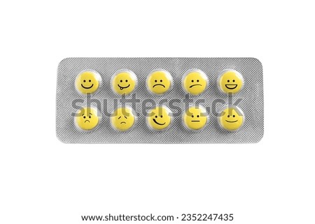 Yellow pills with different emotional faces in blister on white background