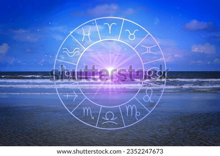Zodiac wheel and beautiful view on sea under blue sky with clouds