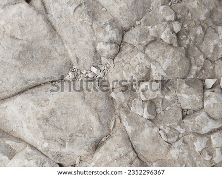 Closeup white limestone rock texture details real photo for background
