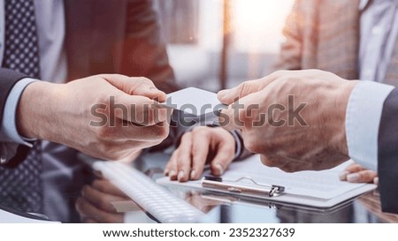 businessman offer personal contact information to customer, acquaintance concept Royalty-Free Stock Photo #2352327639