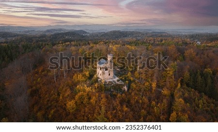 Stunning little castle near city of Karpacz in Poland. Prince Henryk Castle is located in village called Staniszów. Lovely small castle during the sunset in autumn. Gorgeous polish landscape and tones Royalty-Free Stock Photo #2352376401