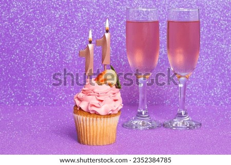 Cupcake With Number And Glasses With Wine For Birthday Or Anniversary Celebration; Number Eleven.