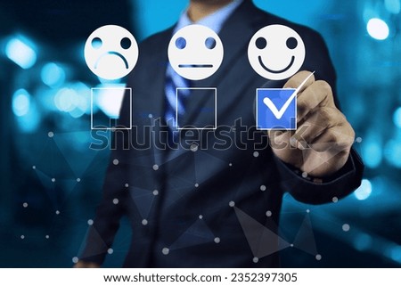 Businessman evaluate satisfaction service product provider in the blue check box to complete customer reviews feedback for rating reply in very good satisfied smiley face on blue background.