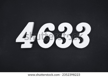 Black for the background. The number 4633 is made of white painted wood.