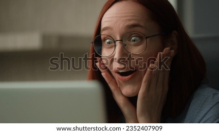 Close up amazed shocked Caucasian business woman surprised with unexpected unbelievable good news looking at computer screen excited happy girl businesswoman in office winning achieve laptop wonder Royalty-Free Stock Photo #2352407909