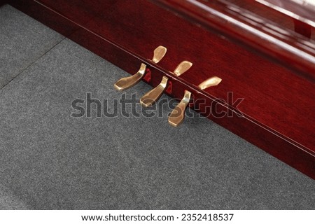 Close up brass piano pedals background,piano sustain paddle