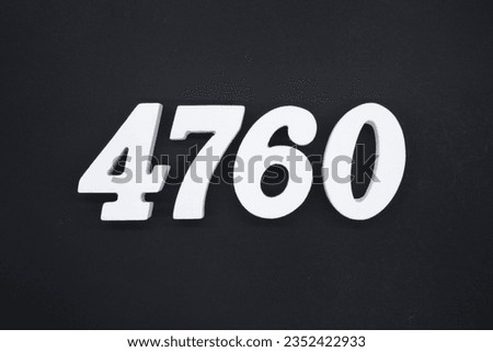 Black for the background. The number 4760 is made of white painted wood.