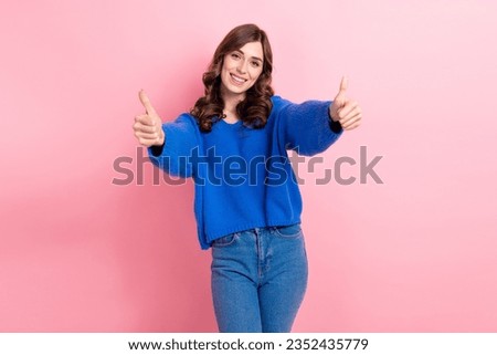 Photo portrait of lovely young lady showing double thumb up good quality wear trendy blue garment isolated on pink color background Royalty-Free Stock Photo #2352435779