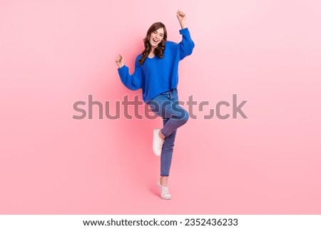 Full size photo of lovely young lady win lottery energetic dance wear trendy blue garment isolated on pink color background Royalty-Free Stock Photo #2352436233