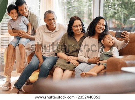Happy family, selfie and grandparents and kids on sofa for holiday, love and relax together at home. Interracial people, mother and father with children in living room, profile picture or photography