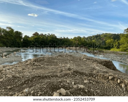 River damage due to class C mining Royalty-Free Stock Photo #2352453709