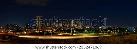 A panoramic view of the beautiful downtown Denver skyline illuminated at night