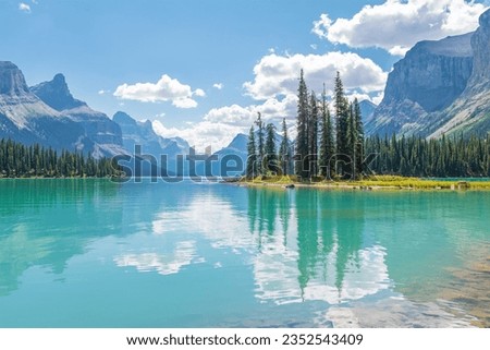 Spirit Island reflection in Maligne Lake, Jasper national park, Canada. Royalty-Free Stock Photo #2352543409