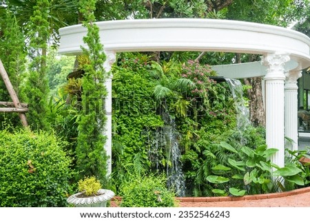 The Fountain with Classical architectural order in garden,Antique marble column concept in garden,Architecture and art of ancient Greece and Rome.