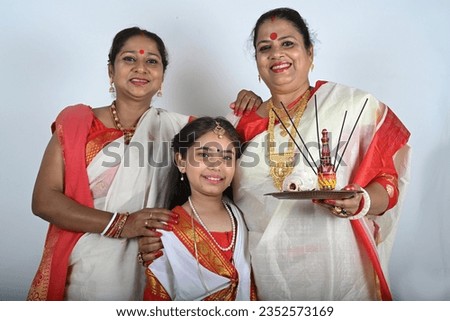 Portrait of a Bengali family celebrating festival together