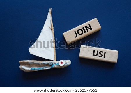 Join us symbol. Concept word Join us on wooden blocks. Beautiful deep blue background with boat. Business and Join us concept. Copy space