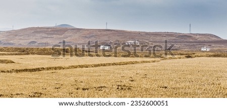 Panoramic view of poor and empty countryside, near Kaesong, Democratic Peoples's Republic of Korea (DPRK), North Korea Royalty-Free Stock Photo #2352600051
