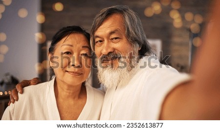 Selfie, relax and love with old couple at spa for social media, anniversary and celebration. Beauty treatment, massage and profile picture with portrait of Asian man and woman at hotel for wellness