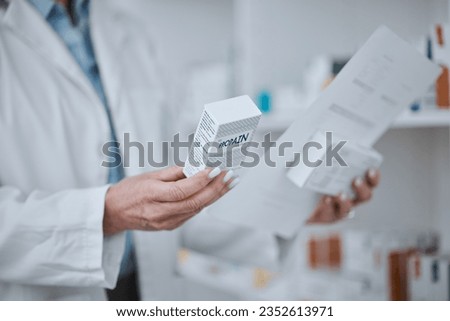 Person, pharmacist and hands with box of medication, pharmaceutical or pills on shelf at drugstore. Closeup of medical or healthcare employee with drugs, prescription meds or inspection at pharmacy Royalty-Free Stock Photo #2352613971