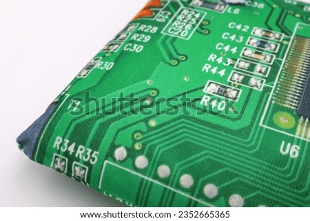 Green geek motherboard pillow for sleeping comfortably for computer nerds and gamers on white background